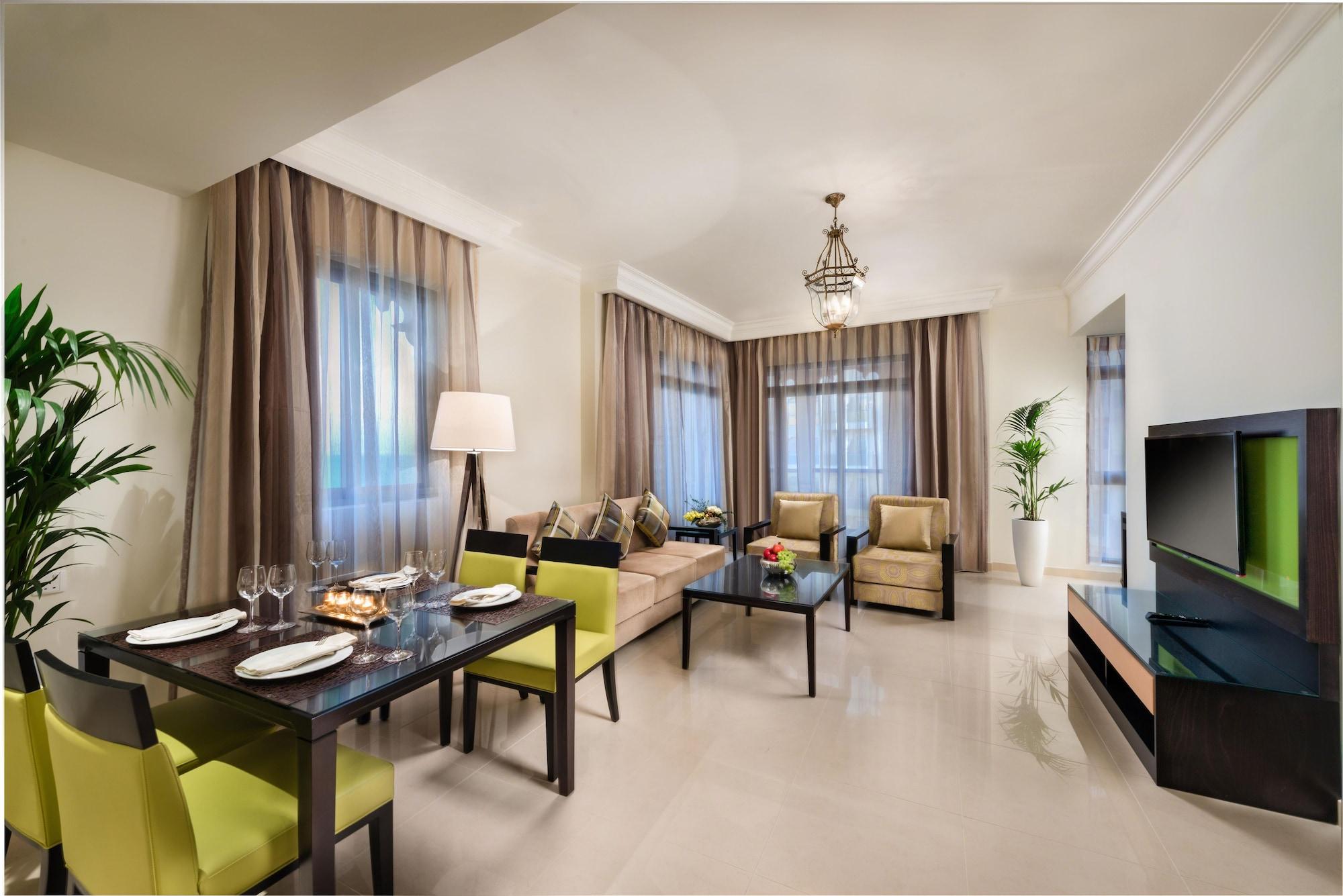 Bahi Ajman Palace Hotel Exterior foto A living room at the hotel