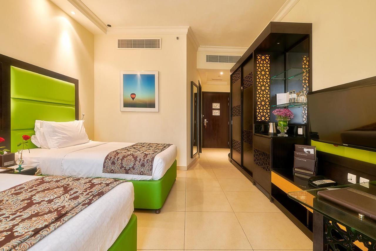 Bahi Ajman Palace Hotel Exterior foto Deluxe room